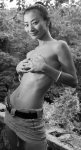 Sometimes the sexy chinese actress Bai Ling takes some trip and walks wild in the wild... undressing too, surely because of the  heat